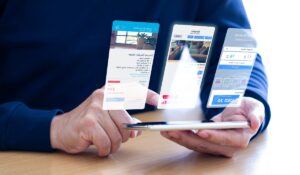 AI digital assistant at hotel front desk helping guests