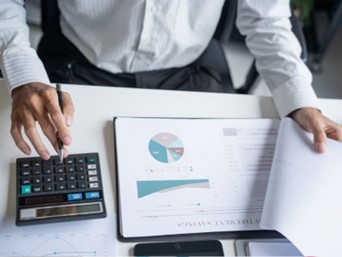 Developer learning blockchain coding through a step-by-step blockchain development tutorial.